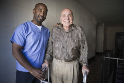 elder man and nurse at home