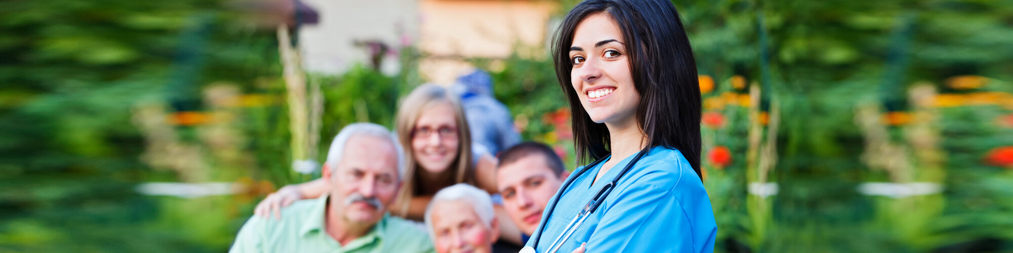 nurse with family in the background