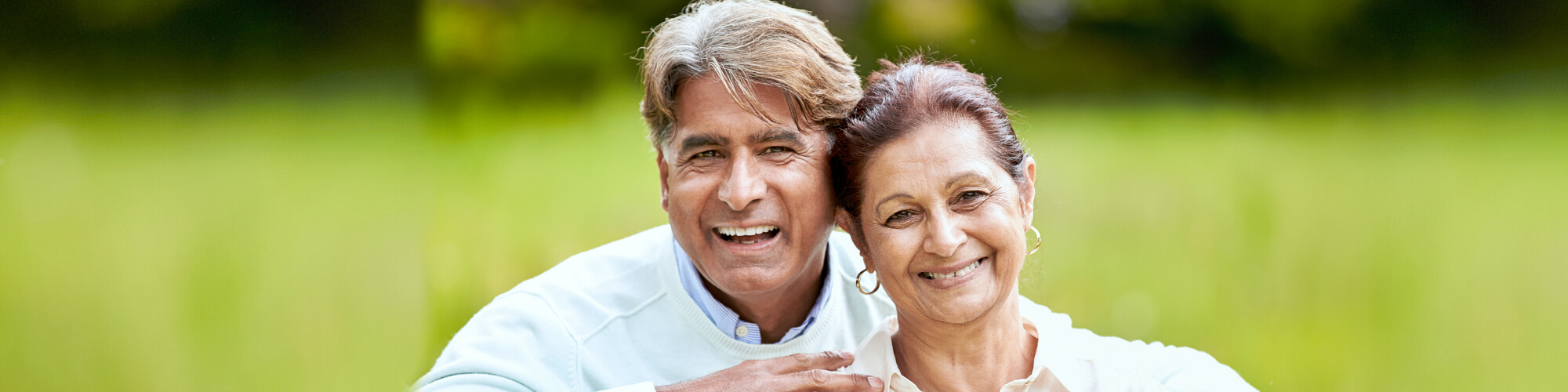 elderly couple smiling